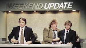 A photo of Chris Farley, Kevin Nealon, and David Spade