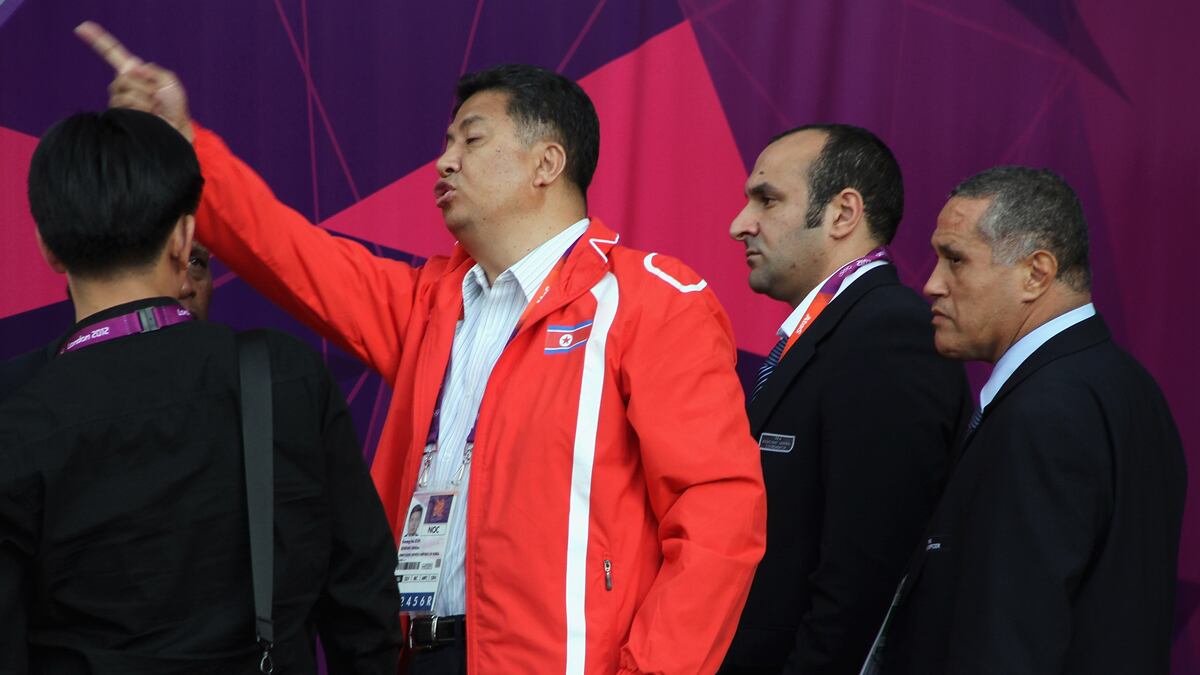 cheats/2012/07/25/olympics-sorry-for-flag-flap/north-korea-flag-soccer-cheat_dshxv0