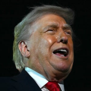 President Donald Trump speaks with reporters before boarding Air Force One at Palm Beach International Airport, in West Palm Beach, Florida on Jan. 19, 2026.