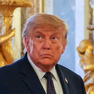 U.S. President Donald Trump  receives a tour of Chateau de Versailles from President of France Emmanuel Macron ahead of a dinner in Versailles, France, June 17, 2026.