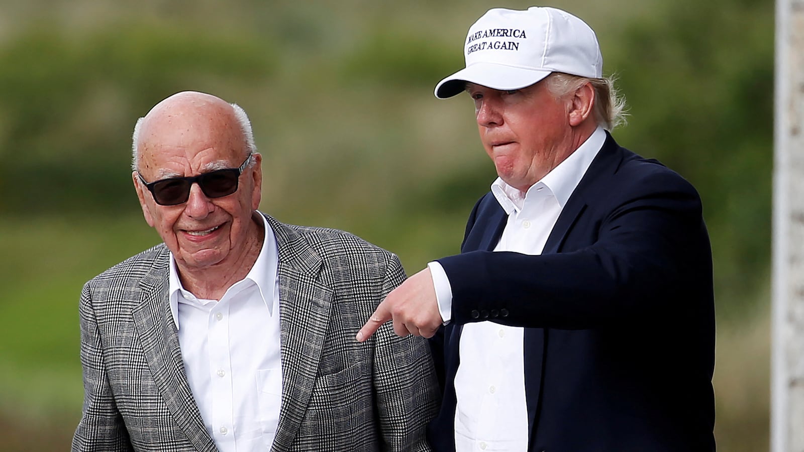 Bosom buddies: Rupert Murdoch and Donald Trump.
