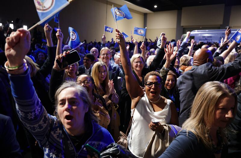 RICHMOND, VIRGINIA - NOVEMBER 04: Supporters celebrate during the election night watch party for Virginia Democratic gubernatorial candidate, former Rep. Abigail Spanberger as she is projected to win the race at the Greater Richmond Convention Center on November 04, 2025 in Richmond, Virginia. Spanberger defeated Republican gubernatorial candidate Lieutenant Gov. Winsome Earle-Sears to become the first female governor in the commonwealth’s history in an election that was seen as a national political bellwether leading into the midterms.