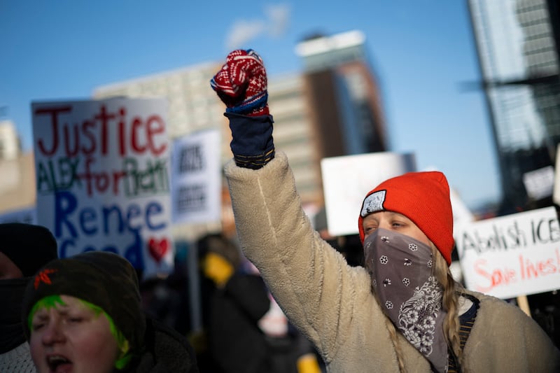 Protesters against Immigration and Customs Enforcement (ICE) march through the streets of downtown Minneapolis, Minnesota, on January 25, 2026.