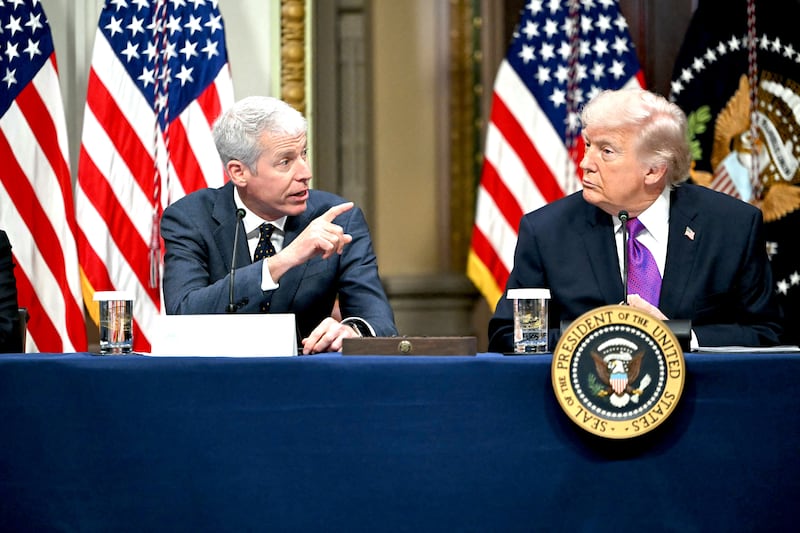 US President Donald Trump listens to Energy Secretary Chris Wright