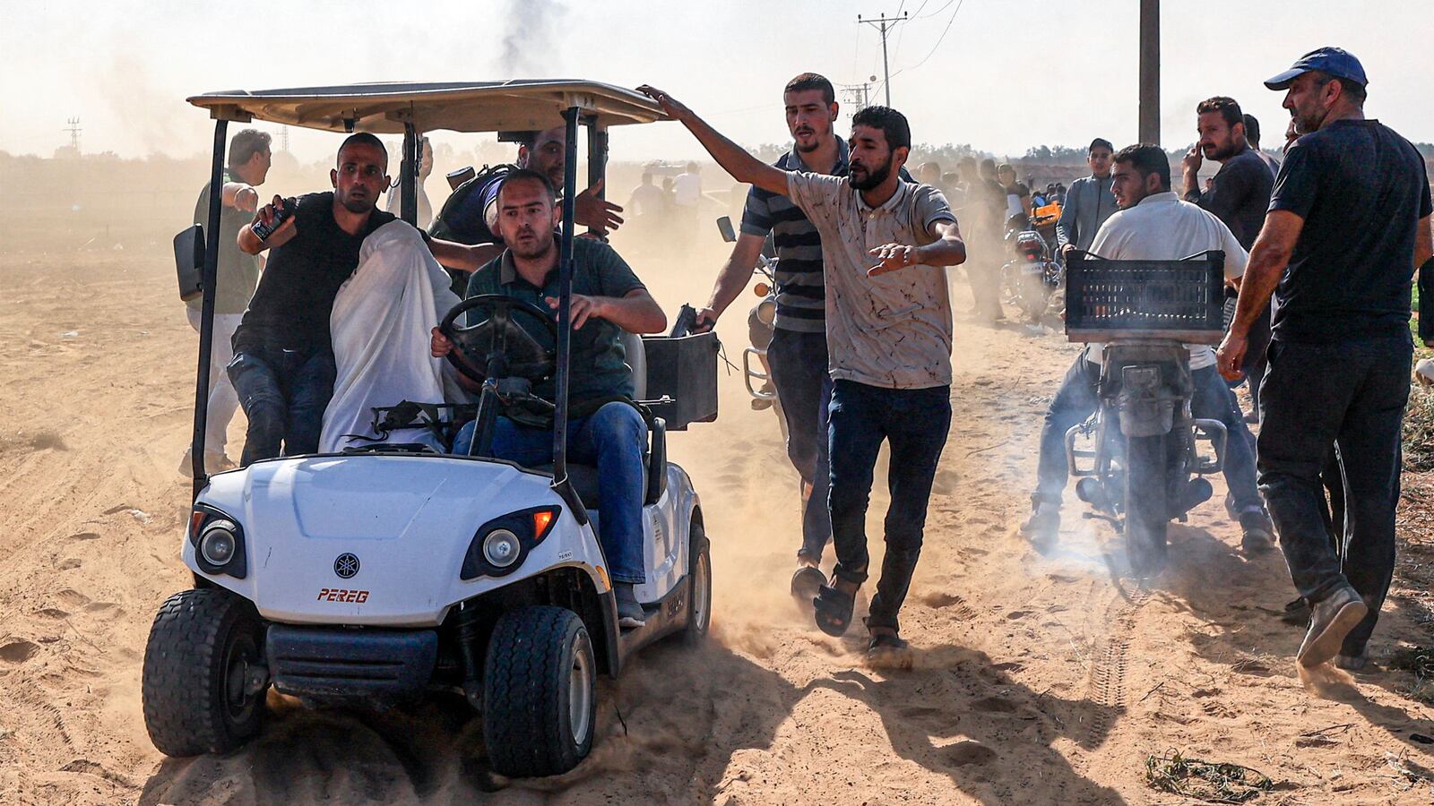 An Israeli hostage is taken to Gaza City.