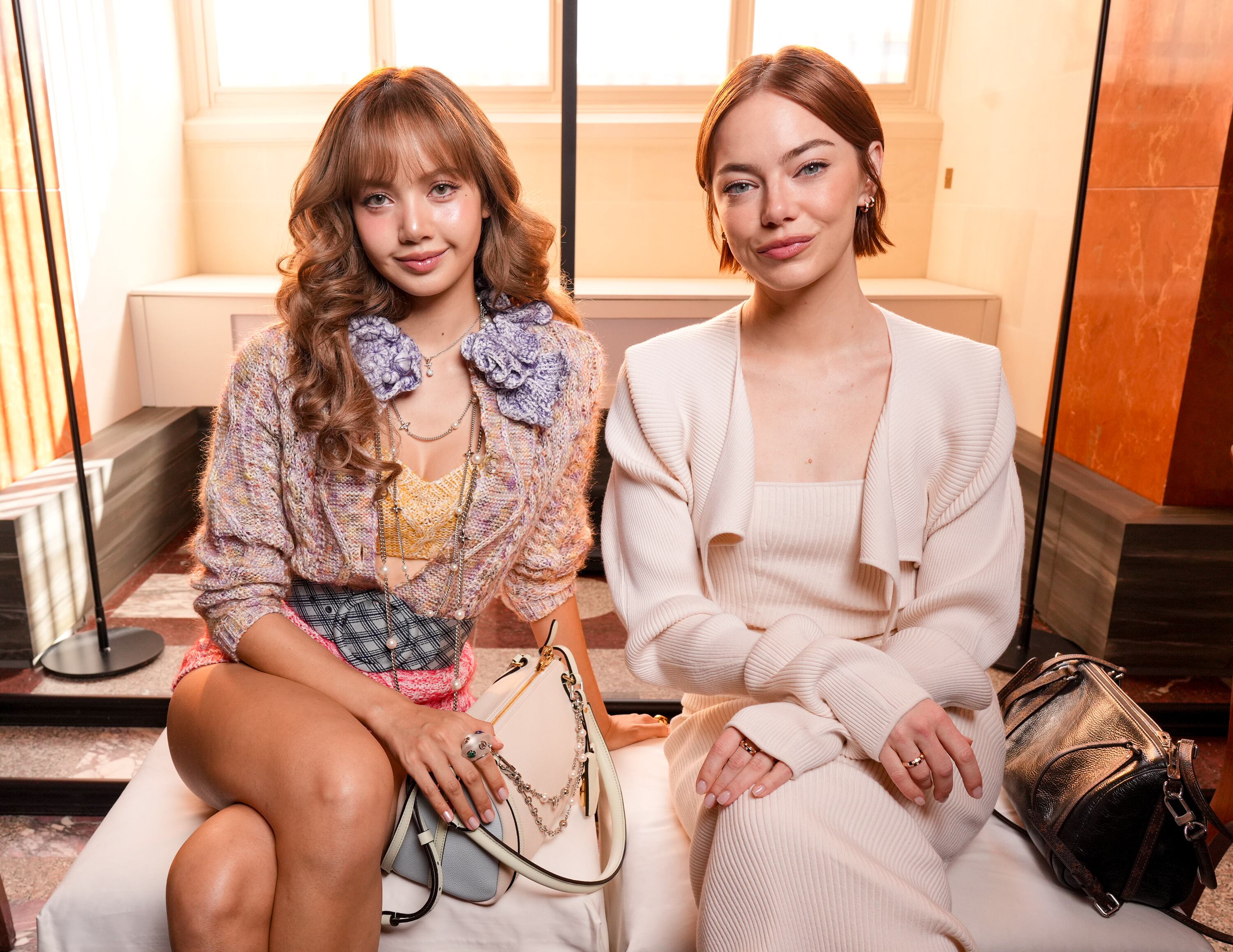 Lisa and Emma Stone at the Louis Vuitton Fashion Show