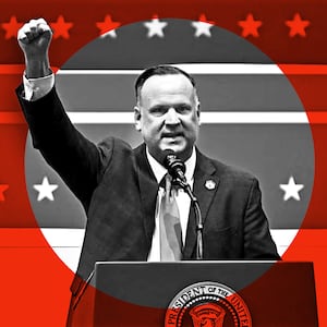 Photo illustrative split of a tweet calling the haircut of Dan Scavino pictured in the Vanity Fair story looking like that of a Nazi, next to a photo of Scavino raising a fist