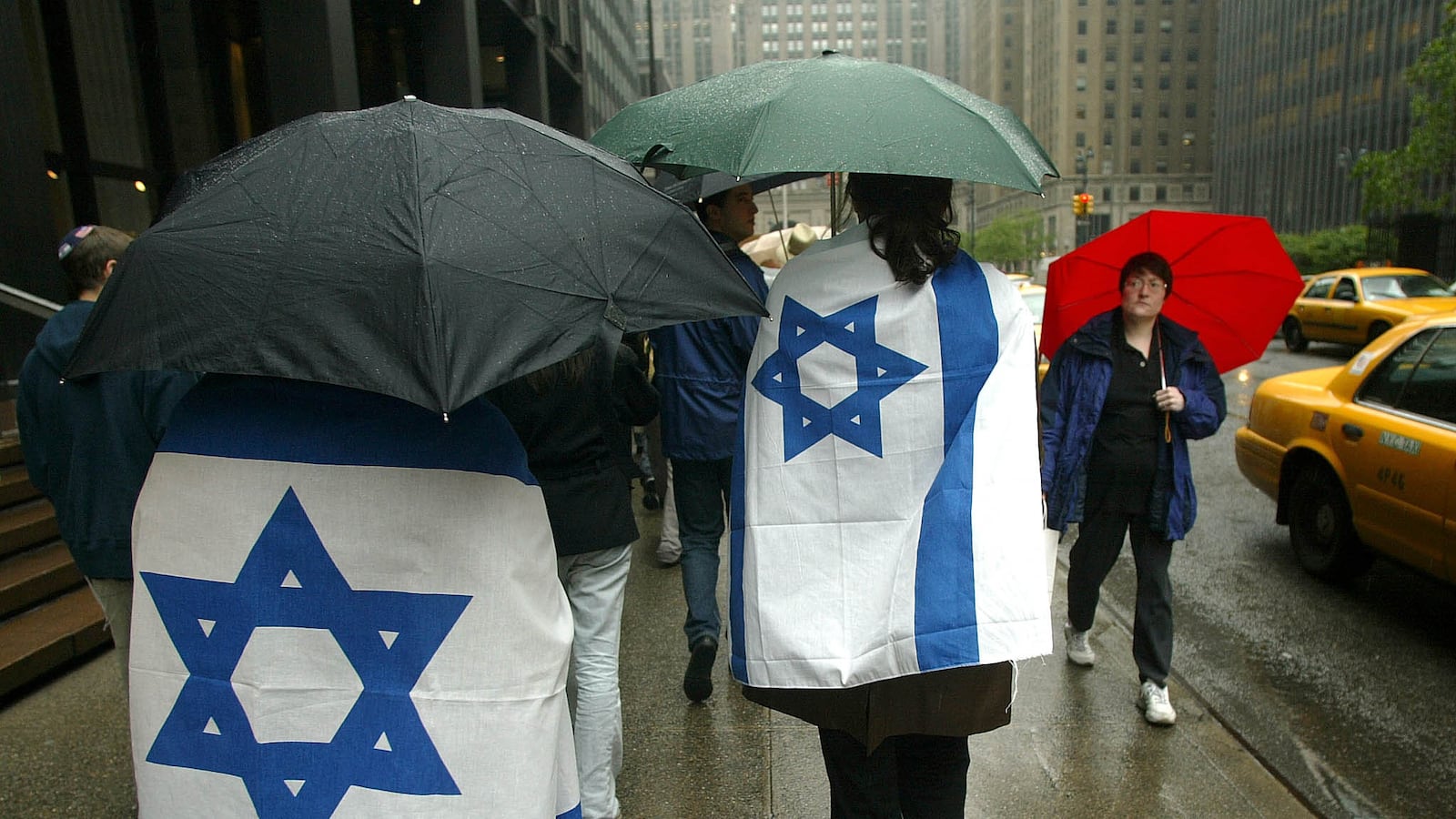 articles/2012/04/02/zionism-the-only-way-forward/umbrellas-israeli-flags-openz_l2pvqy