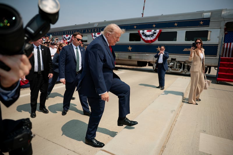 U.S. President Donald Trump walks next to a ceremonial train after arriving for the dedication of the Theodore Roosevelt Presidential Library in Medora, North Dakota, U.S., July 1, 2026.