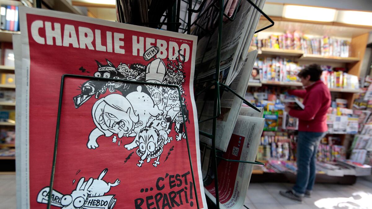 cheats/2015/03/19/putin-le-pen-have-sex-in-charlie-hebdo/150319-hebdo-cheat_c3apkl