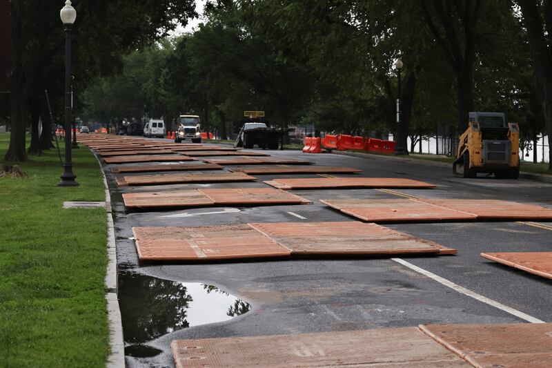 Plates used to protect the pavement from potential damage made by maneuvering U.S. Army tanks lie on the street as preparations continue for the U.S. Army’s 250th Birthday Festival and Parade in Washington, D.C., U.S., June 8, 2025. REUTERS/Aaron Schwartz