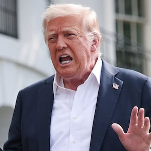 WASHINGTON, DC - JULY 11: U.S. President Donald Trump answers questions while departing the White House on July 11, 2025 in Washington, DC. Trump is scheduled to travel to Central Texas today to meet with first responders and local elected officials involved with the recovery process from last week's flash flooding event that has claimed more than 120 lives.  (Photo by Win McNamee/Getty Images)