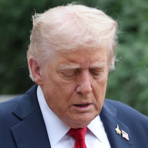 WASHINGTON, DC - SEPTEMBER 30: U.S. President Donald Trump walks toward members of the media before answering questions while departing the White House on September 30, 2025 in Washington, DC. President Trump is traveling to Marine Corps Base Quantico to deliver remarks to senior military leaders. (Photo by Win McNamee/Getty Images)