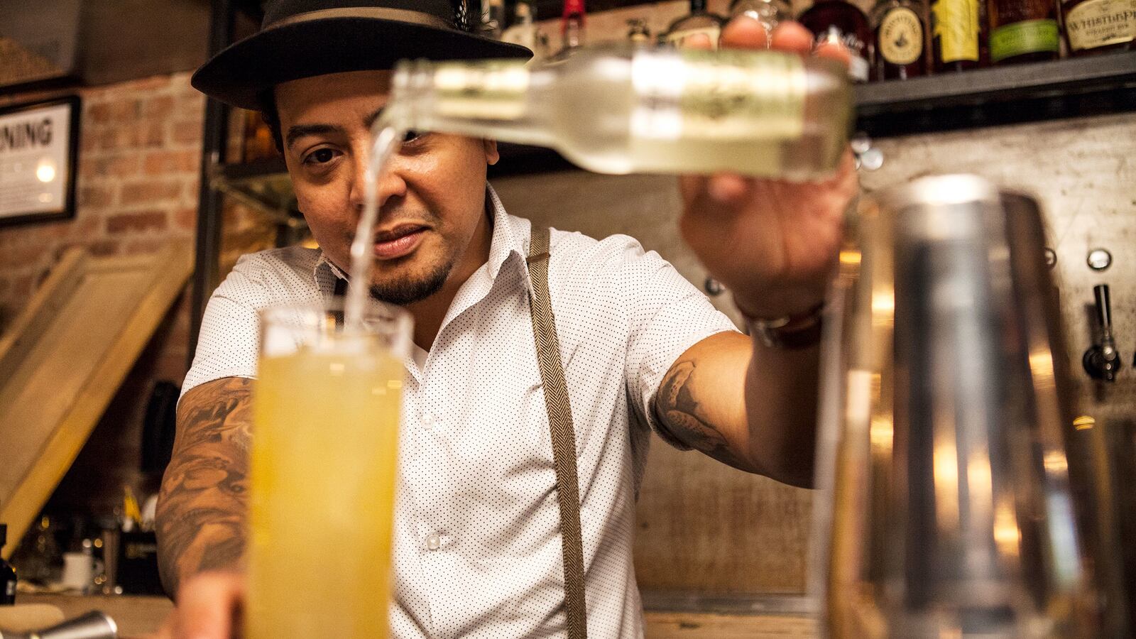 articles/2016/10/21/mamie-taylor-is-the-original-moscow-mule/162010-bartender-in-focus-pouring-tease_arxvvc