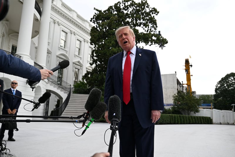 US President Donald Trump speaks to the media as he departs the White House on the South Lawn in Washington, DC, US, September 26, 2026.