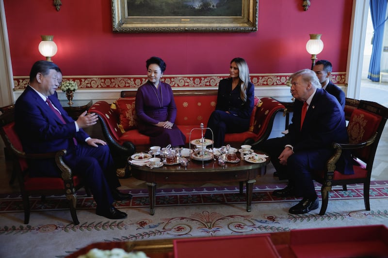US President Donald Trump and first lady Melania Trump participate in tea with Chinese President Xi Jinping and his wife, Peng Liyuan, in the Red Room of the White House in Washington, DC, US, September 25, 2026. REUTERS/Evan Vucci