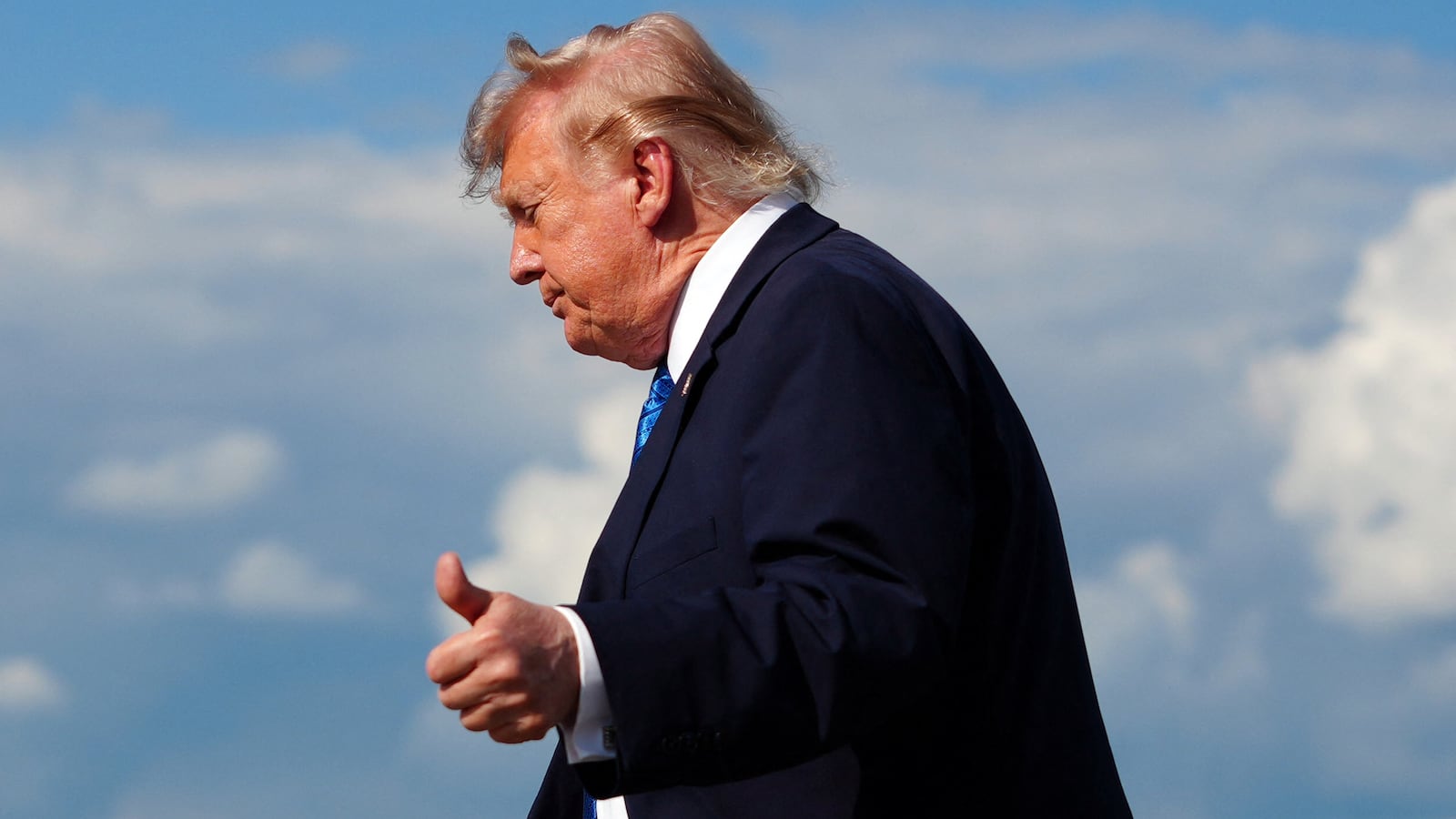Donald Trump flashes a thumbs up