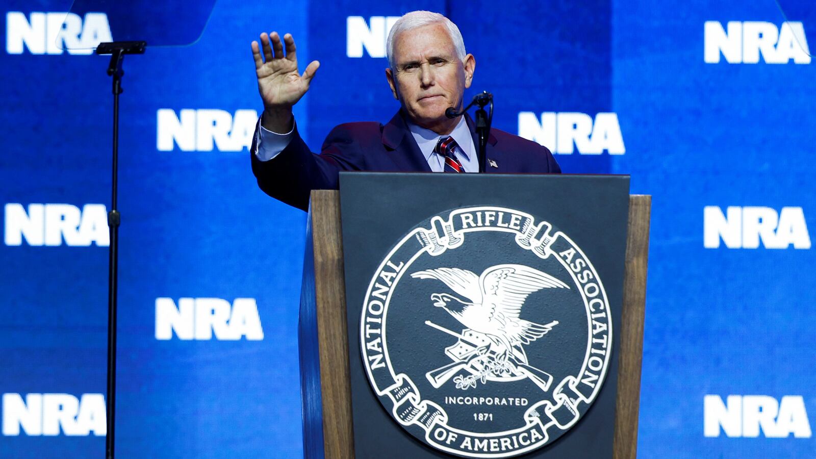 Mike Pence speaks at a podium at the 2023 NRA convention.