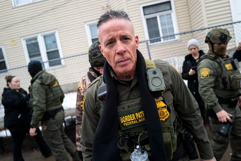 Border Patrol Chief Gregory Bovino (C) looks on as federal agents arrest a man on January 08, 2026 in Minneapolis, Minnesota.