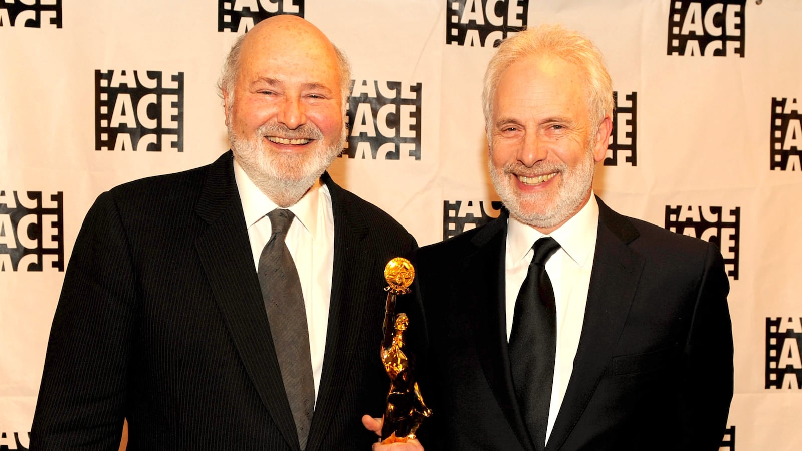 Director Rob Reiner (L) poses with his Golden Eddie Award with actor Christopher Guest at the 60th Annual ACE Eddie Awards at the Beverly Hilton Hotel on February 14, 2010 in Beverly Hills, California.