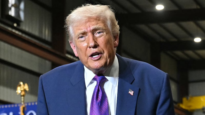 US President Donald Trump gestures at the end of his speech after touring the Coosa Steel Corporation factory in Rome, Georgia, February 19, 2026. (Photo by SAUL LOEB / AFP via Getty Images)