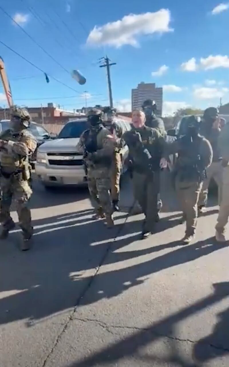 Border Patrol Chief Greg Bovino throws tear gas in Little Village, Chicago, Illinois.