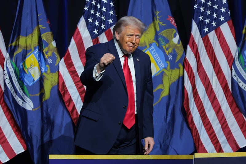 U.S. President Donald Trump  gestures after delivering remarks to members of the Detroit Economic Club at the MotorCity Casino Hotel on January 13, 2026 in Detroit, Michigan. Trump has spent the day in Detroit participating in a tour of the Ford River Rouge complex. (Photo by Anna Moneymaker/Getty Images)