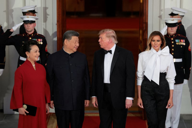 US President Donald Trump and first lady Melania Trump welcome Chinese President Xi Jinping and his wife, Peng Liyuan, at the North Portico of the White House for a state dinner in Washington, D.C., US, September 24, 2026. REUTERS/Kylie Cooper     TPX IMAGES OF THE DAY