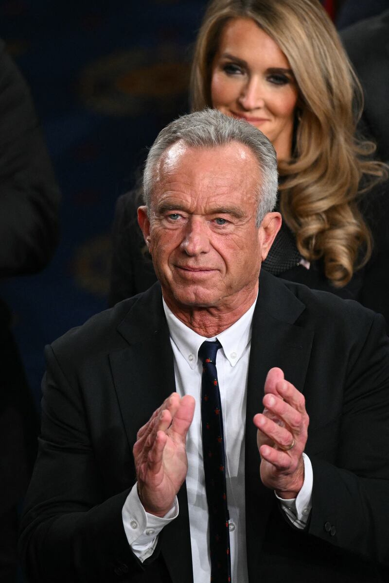 Secretary of Health and Human Services Robert F. Kennedy Jr. applauds as US President Donald Trump delivers the State of the Union address.