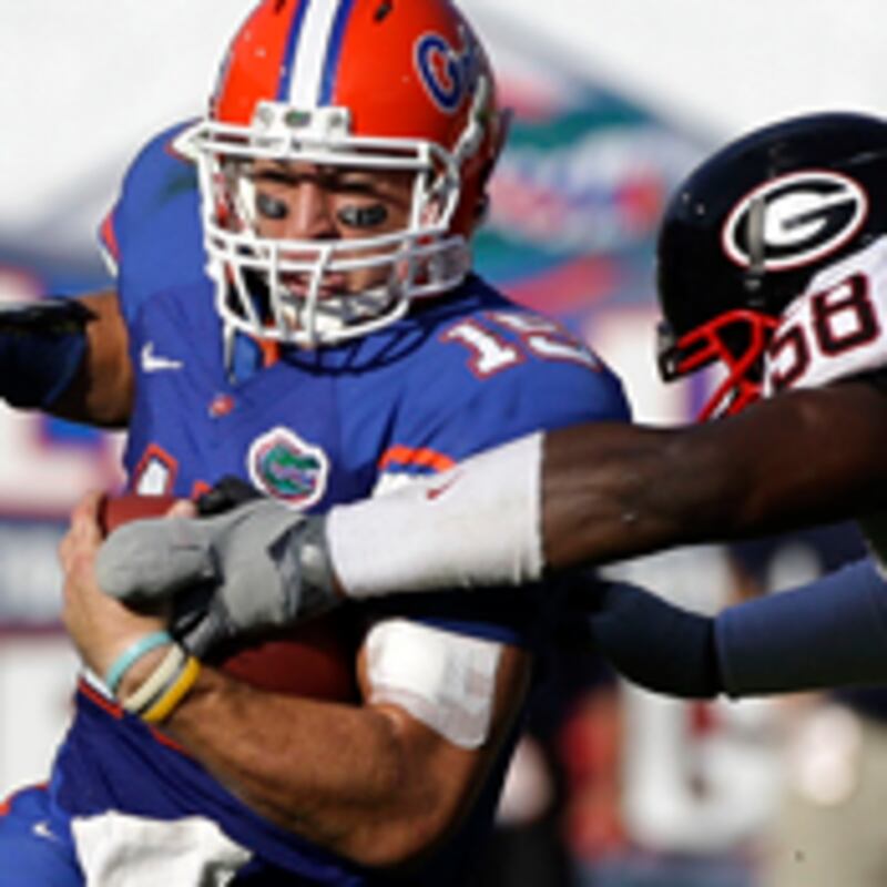 articles/2009/12/02/the-politics-of-college-football/curtis-bfootball-fleischer-obama_66850_gzx0vj