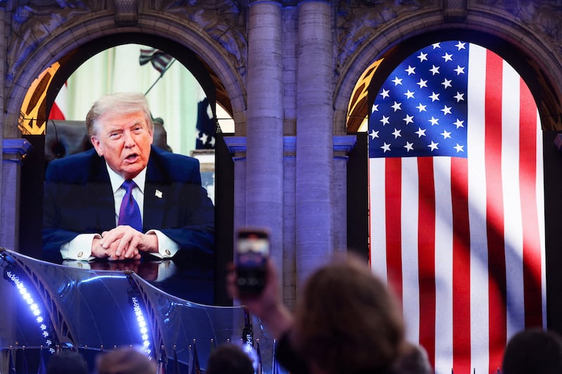 U.S. President Donald Trump appears on a screen, during an event organized by the U.S. Mission to Belgium to mark the 250th anniversary of American independence, at Cinquantenaire Park, in Brussels, Belgium, June 28, 2026.
