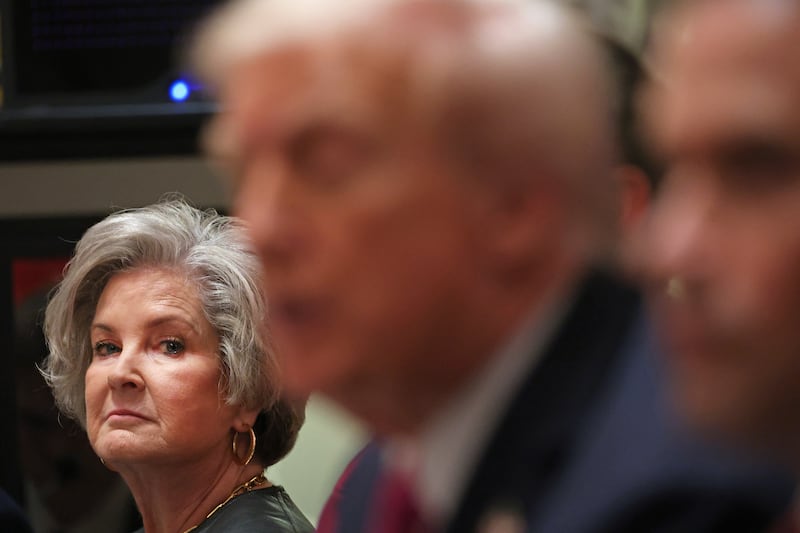 White House Chief of Staff Susie Wiles (L) looks on at President Donald Trump in the Cabinet Room of the White House in Washington, DC, on October 17, 2025.