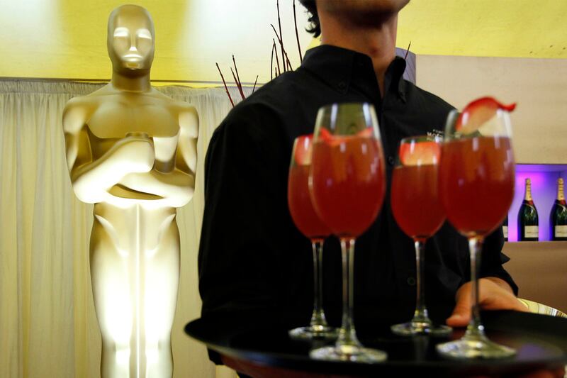 articles/2012/02/24/oscars-drinking-guide-recipes-for-film-inspired-cocktails/oscars-night-punch-cocktails-brown_hddziq