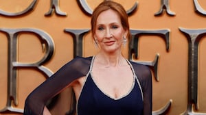 British writer J.K Rowling poses on the red carpet after arriving to attend the World Premiere of the film "Fantastic Beasts: The Secrets of Dumbledore" in London on March 29, 2022.