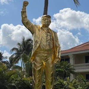 Donald Trump’s new statue at his golf club in Miami stands 22 feet tall, including its pedestal.