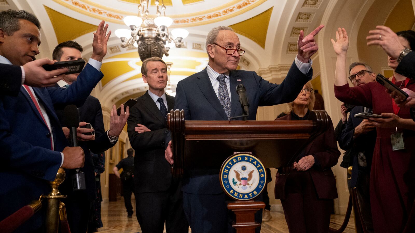 U.S. Senate Majority Leader Chuck Schumer (D-NY) gestures as he speaks with members of the media.