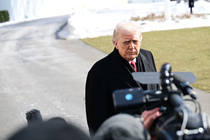 President Donald Trump speaks to reporters prior to departing the White House in Washington, D.C. on January 27, 2026.