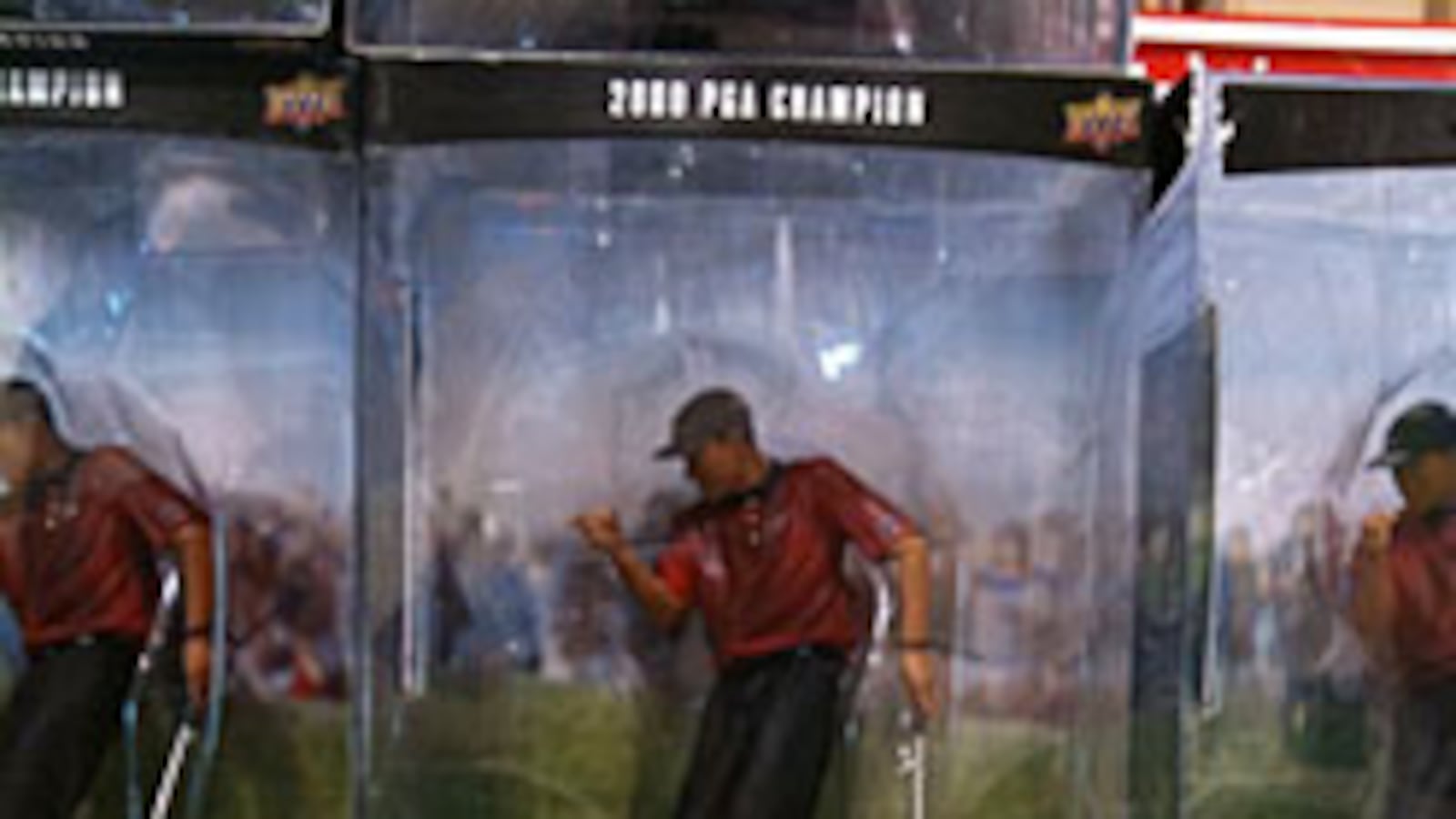 articles/2009/12/08/tiger-woods-fire-sale/mcdonald-tiger-woods-action-figure_67897_svkybz