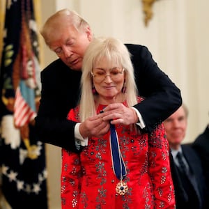 Former President Donald Trump awards the 2018 Presidential Medal of Freedom to Miriam Adelson