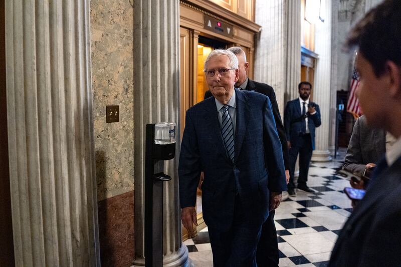 Sen. Mitch McConnell walking to cast a vote in the Senate at the end of September.