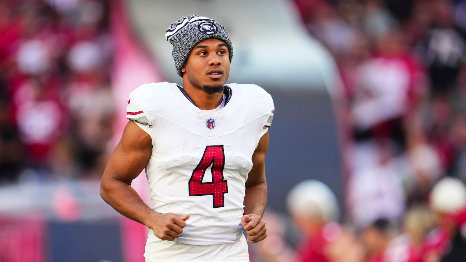 GLENDALE, AZ - DECEMBER 17: Rondale Moore #4 of the Arizona Cardinals runs out of the tunnel prior to an NFL football game against the San Francisco 49ers at State Farm Stadium on December 17, 2023 in Glendale, Arizona. (Photo by Cooper Neill/Getty Images)