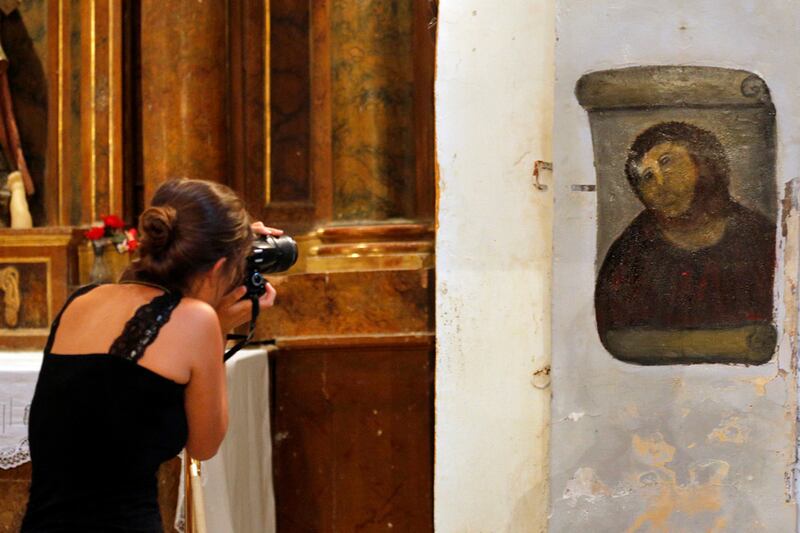 articles/2012/09/21/spain-woman-who-ruined-religious-fresco-wants-royalties/spanish-fresco-govan-telegraph_a9dhmt