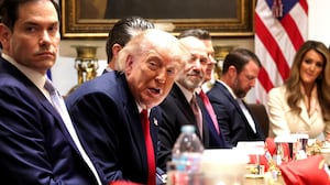 WASHINGTON, DC - MAY 27: U.S. President Donald Trump (C) speaks as (L-R) U.S. Interior Secretary Doug Burgum, U.S. Secretary of State Marco Rubio, U.S. Secretary of War Pete Hegseth, U.S. Commerce Secretary Howard Lutnick, U.S. Transportation Secretary Sean Duffy, U.S. Secretary of Homeland Security Markwayne Mullin and Administrator of the U.S. Small Business Administration Kelly Loeffler listen during a Cabinet meeting in the Cabinet Room of the White House on May 27, 2026 in Washington, DC. Trump meets with his Cabinet days after saying a peace deal with Iran was “largely negotiated” amid expectations around the re-opening the Strait of Hormuz. (Photo by Win McNamee/Getty Images)