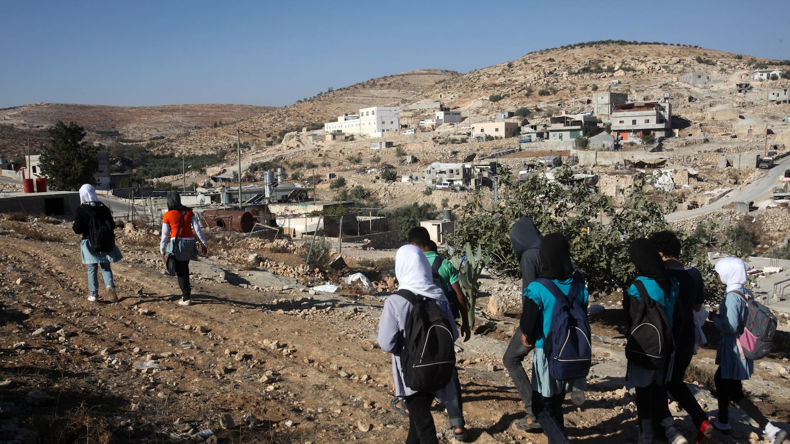 articles/2013/11/12/when-israeli-settlers-direct-violence-at-palestinian-schoolchildren/OZ-schoolchildren-westbank_wiqzeh