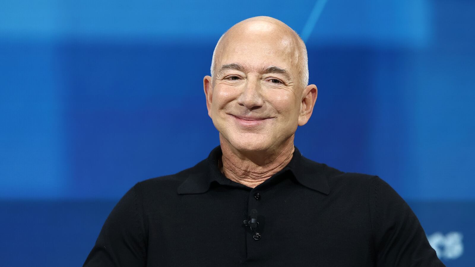 NEW YORK, NEW YORK - DECEMBER 04: Jeff Bezos, founder and executive chairman of Amazon and owner of the Washington Post, looks out into crowd during the New York Times annual DealBook summit at Jazz at Lincoln Center on December 04, 2024 in New York City. The NYT summit with Ross Sorkin returns with interviews on the main stage including Sam Altman, co-founder and C.E.O. of OpenAI, Jeff Bezos, founder and executive chairman of Amazon and owner of the Washington Post, former U.S. President Bill Clinton and Prince Harry, The Duke of Sussex, among others. The discussions will touch on topics such as business, politics and culture. (Photo by Michael M. Santiago/Getty Images)