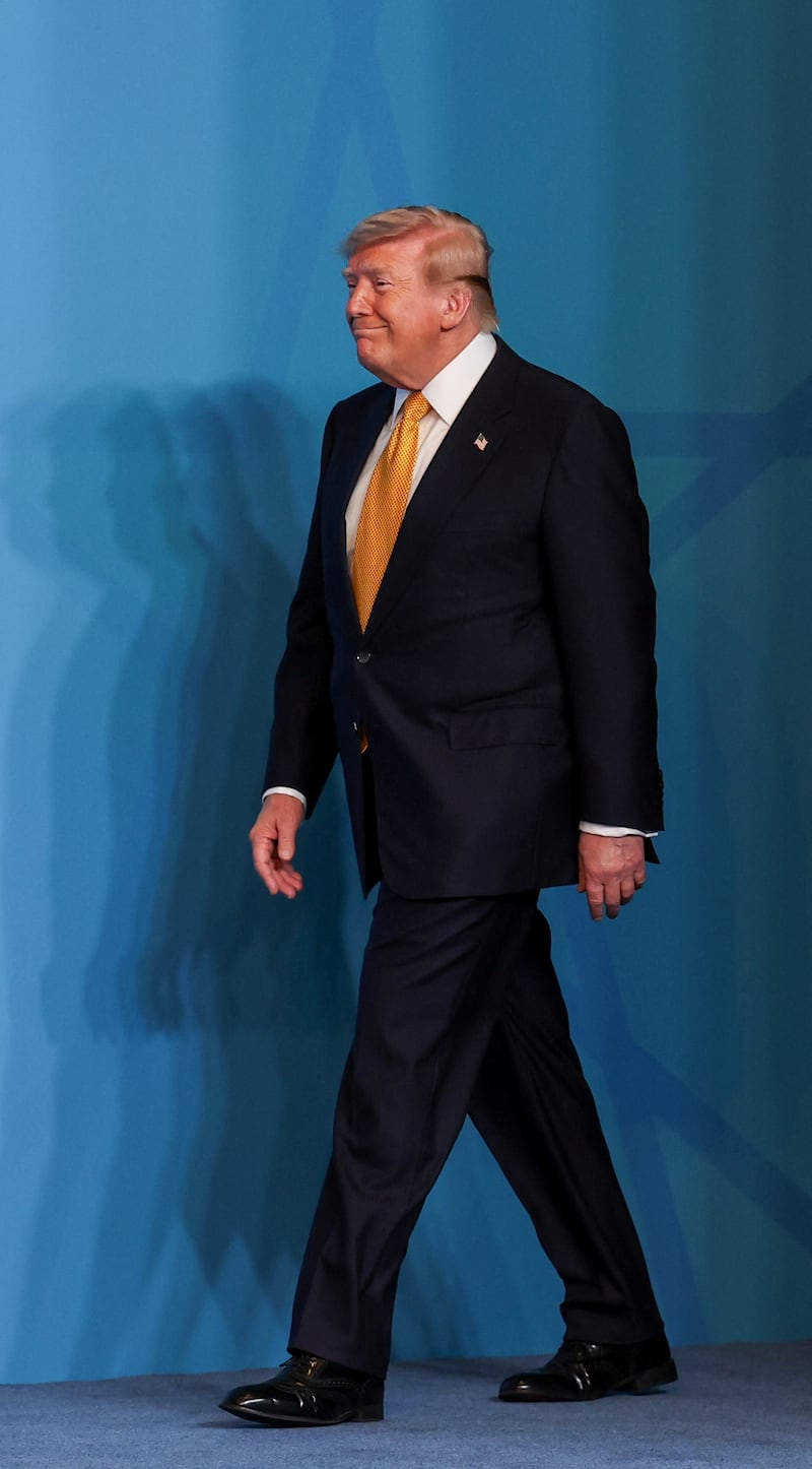 U.S. President Donald Trump walks as he attends a NATO leaders' summit in Ankara, Turkey, July 8, 2026.