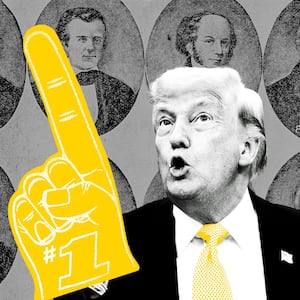 Donald Trump holds up a giant foam finger.