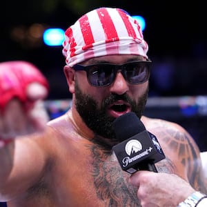 Josh Hokit speaks to Joe Rogan following his win in a heavyweight fight during the UFC Freedom 250 event on the South Lawn at the White House on June 14, 2026 in Washington, DC.