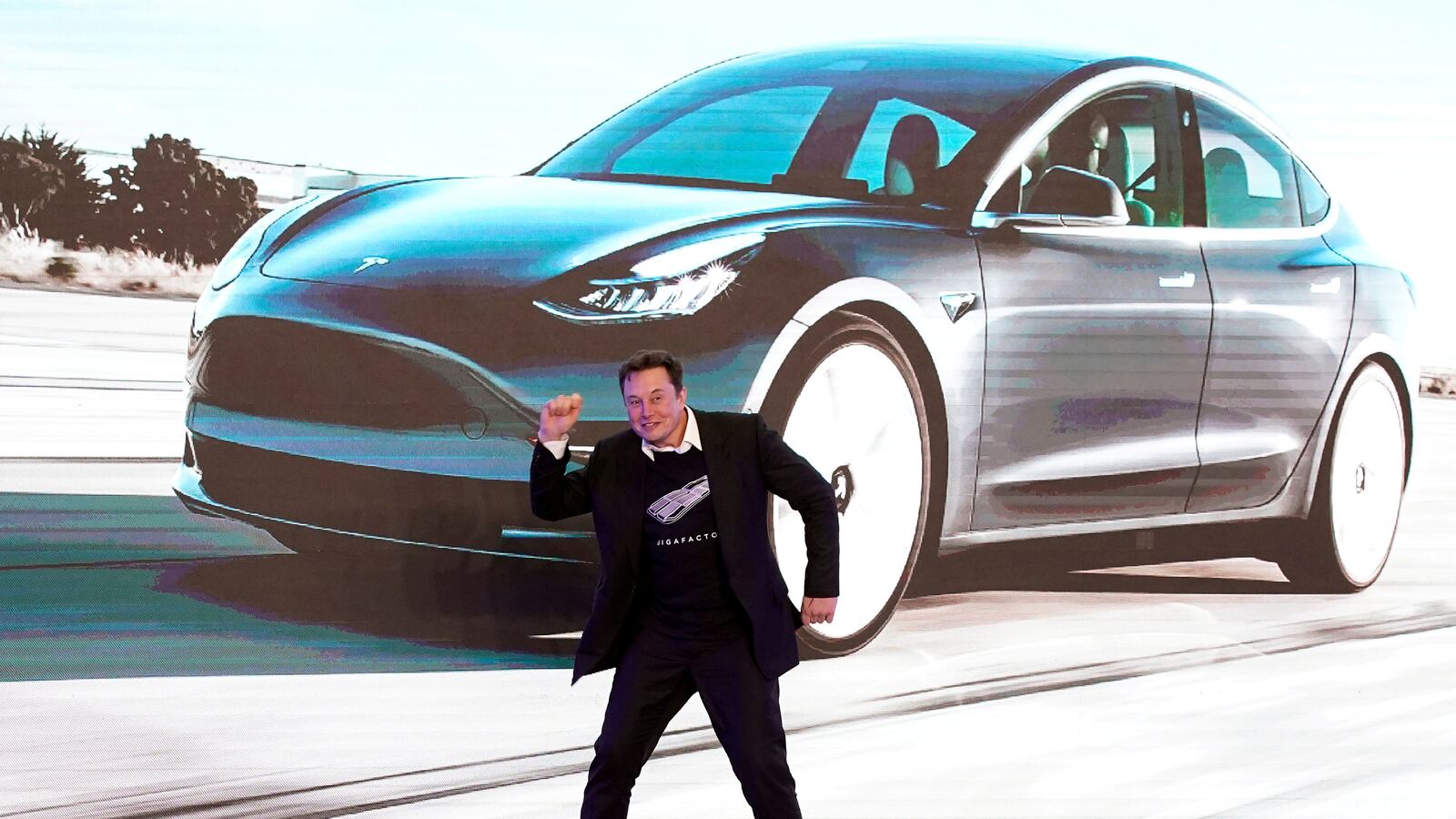 2021-03-15T124302Z_729816481_RC2OBM9QDM31_RTRMADP_3_TESLA-MUSK_nkpu71