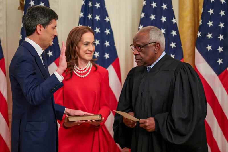 U.S. Supreme Court justice Clarence Thomas swears in the new Federal Reserve Chair Kevin Warsh in the East Room at the White House in Washington, D.C., U.S., May 22, 2026. REUTERS/Jonathan Ernst